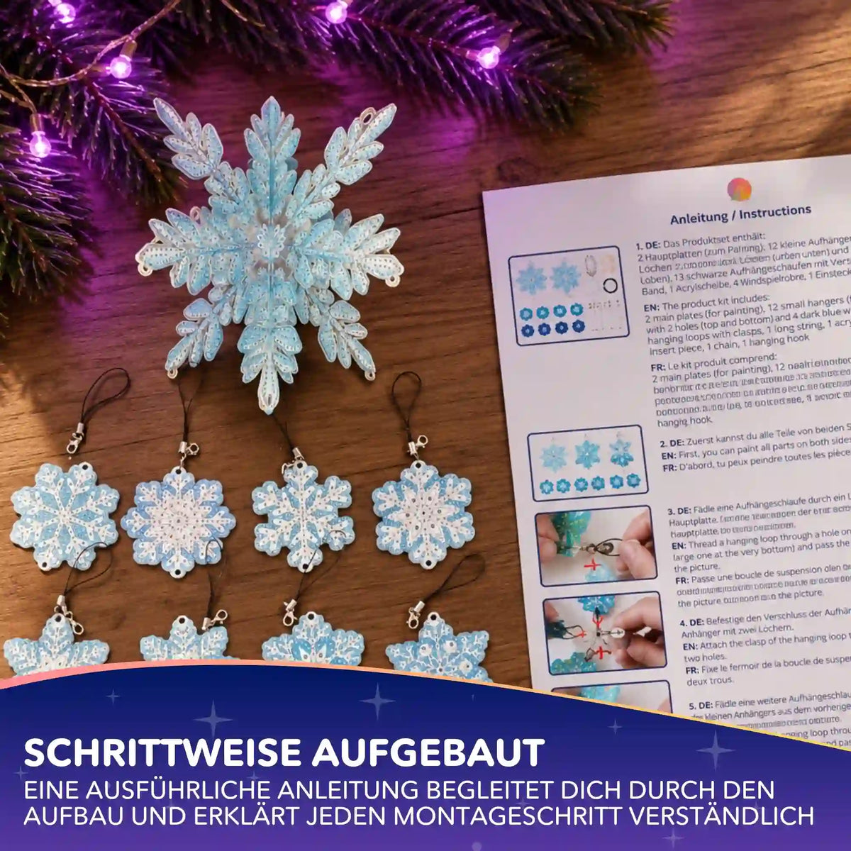Diamond Painting Schneeflocken Windspiel mit glitzernden Anhängern und detaillierter Aufbauanleitung.
