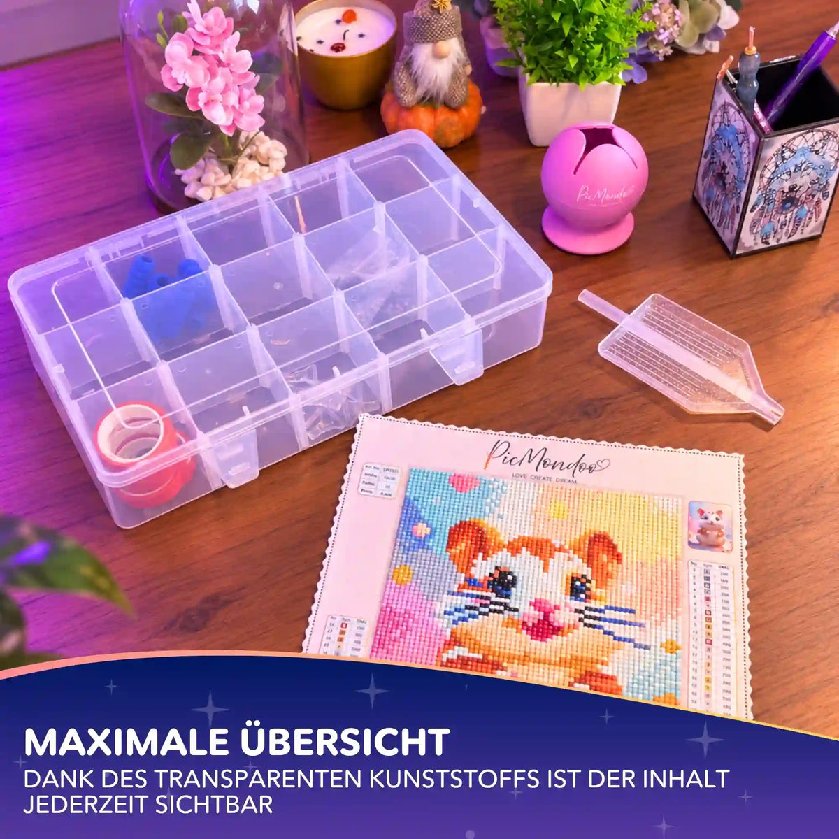 Transparente Diamond Painting Aufbewahrungsbox mit 15 Fächern für Zubehör neben buntem Hamster-Motiv